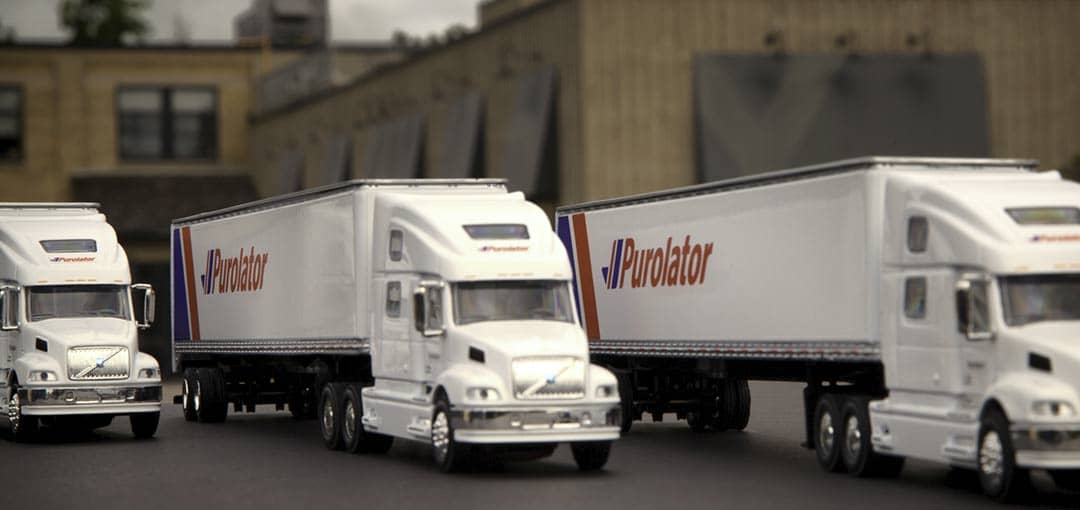 Image of Purolator trucks at Quarry